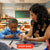 Teacher and student using a ReWrite Max in a classroom
