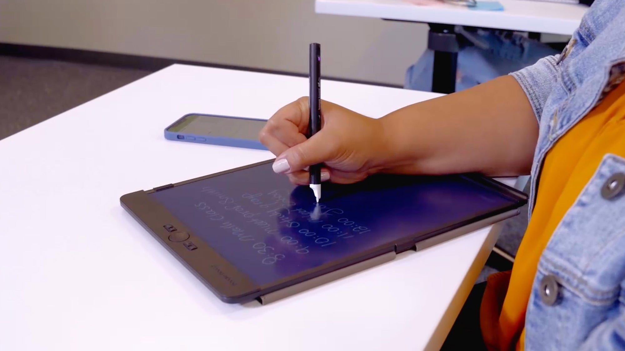 Girl using Blacboard Smart Pen at college
