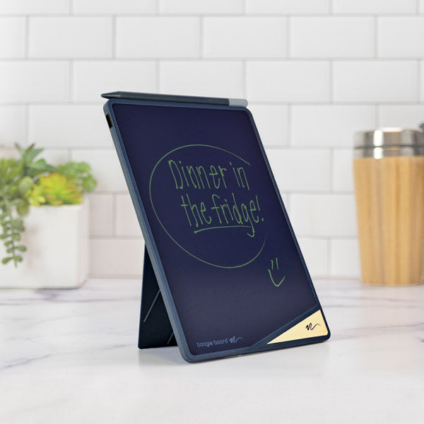 Blue VersaBoard on a kitchen countertop with message written