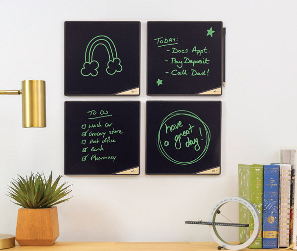 4 VersaTiles on a wall above a desk